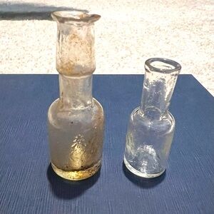 Cute little vintage mini glass bottles